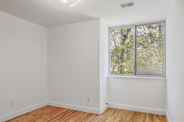 523 Colony Dr, Hartsdale, NY 10530 - unfurnished room featuring baseboards, visible vents, and light wood-style floors