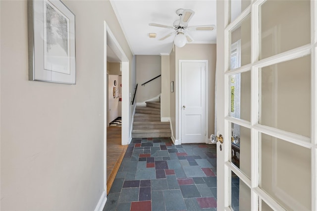 219 Third Ave, Pelham, NY 10803 - corridor with stairway, stone finish floor, crown molding, and baseboards
