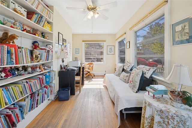 219 Third Ave, Pelham, NY 10803 - living area with baseboards, ceiling fan, wood finished floors, and a wealth of natural light