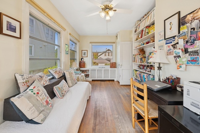 219 Third Ave, Pelham, NY 10803 - office featuring radiator heating unit, hardwood / wood-style floors, and a ceiling fan
