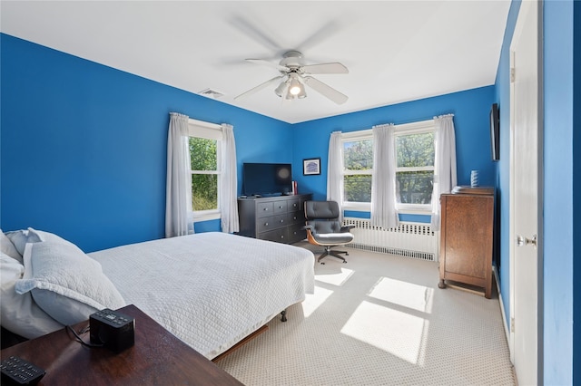 219 Third Ave, Pelham, NY 10803 - bedroom featuring radiator heating unit, carpet floors, and a ceiling fan