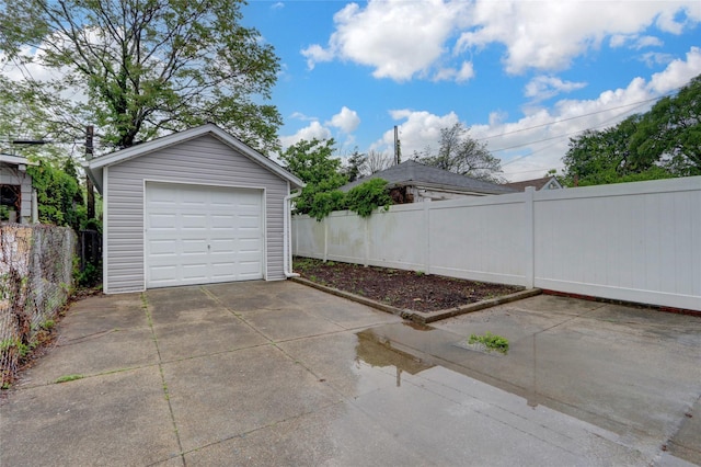 62-22 80th Rd, Glendale, NY 11385 - detached garage with driveway and fence