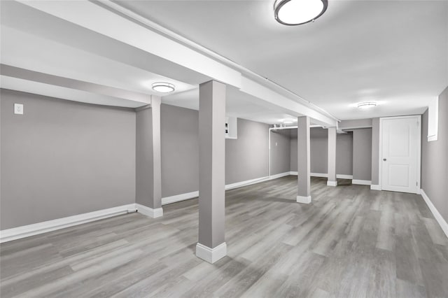 62-22 80th Rd, Glendale, NY 11385 - finished below grade area featuring wood finished floors and baseboards