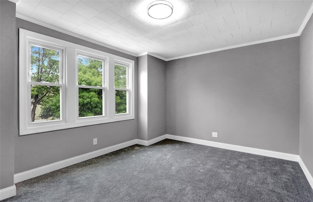 62-22 80th Rd, Glendale, NY 11385 - spare room featuring crown molding, dark carpet, and baseboards