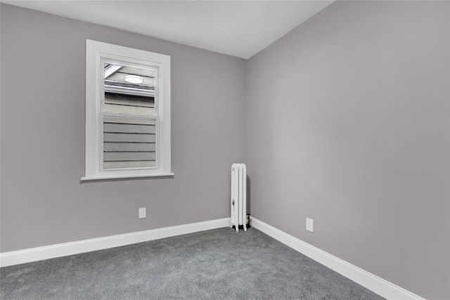62-22 80th Rd, Glendale, NY 11385 - carpeted spare room featuring radiator and baseboards