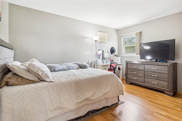 bedroom with light wood-style flooring