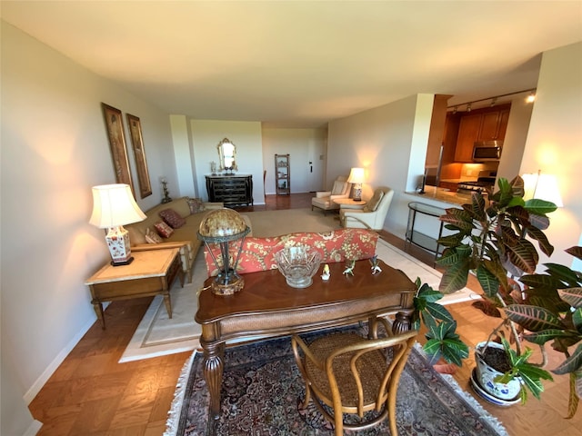 living room featuring baseboards