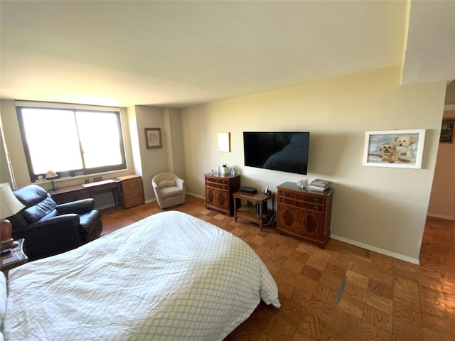 bedroom with baseboards