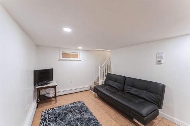 living area with tile patterned flooring, baseboard heating, stairs, baseboards, and recessed lighting