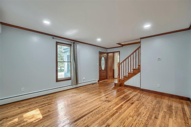 interior space featuring crown molding, stairs, baseboards, a baseboard heating unit, and light wood finished floors