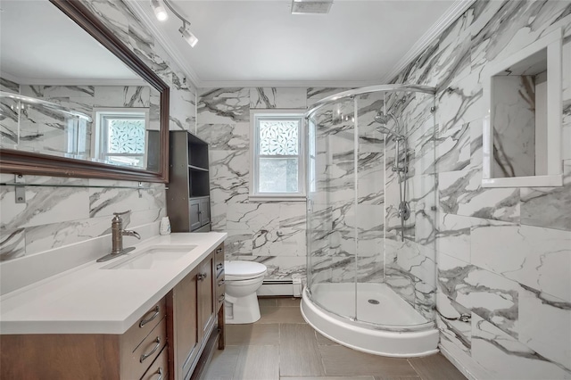 full bath with baseboard heating, tile walls, ornamental molding, and a wealth of natural light