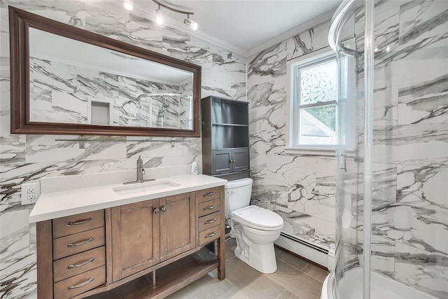 full bathroom featuring vanity, toilet, tile walls, baseboard heating, and a marble finish shower