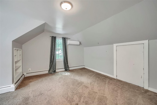 additional living space featuring vaulted ceiling, baseboards, a wall unit AC, and carpet flooring