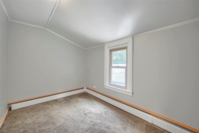 unfurnished room with carpet floors, baseboards, ornamental molding, and lofted ceiling