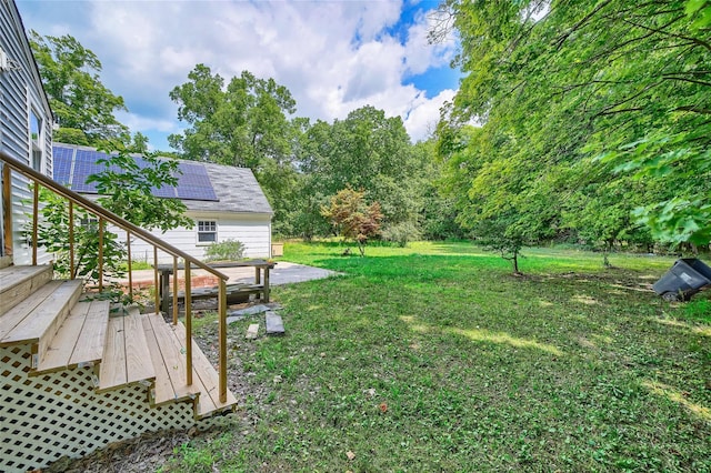 view of yard featuring stairway and a patio area