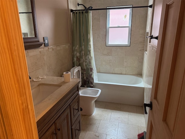 full bathroom with tile walls, vanity, toilet, and shower / bath combination with curtain