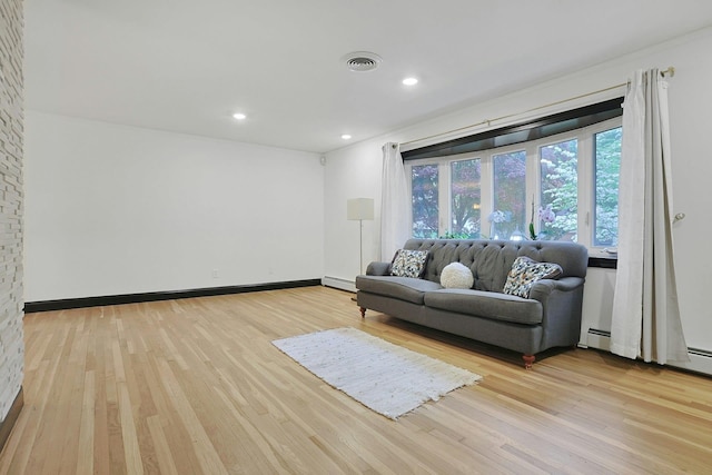 26 Hoke Dr, Stony Point, NY 10980 - living area featuring recessed lighting, a baseboard radiator, light wood finished floors, and visible vents