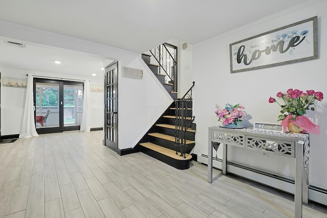 26 Hoke Dr, Stony Point, NY 10980 - staircase featuring wood finished floors, visible vents, recessed lighting, crown molding, and a baseboard radiator
