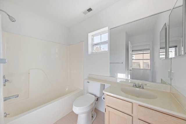 bathroom featuring visible vents, tile patterned flooring, vanity, toilet, and washtub / shower combination