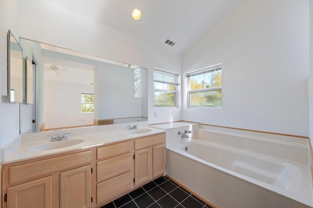 full bath featuring visible vents, a sink, and a healthy amount of sunlight