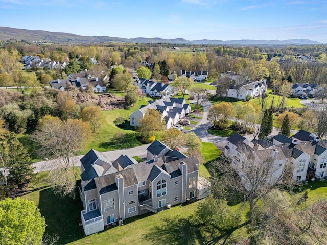 drone / aerial view with a residential view and a mountain view