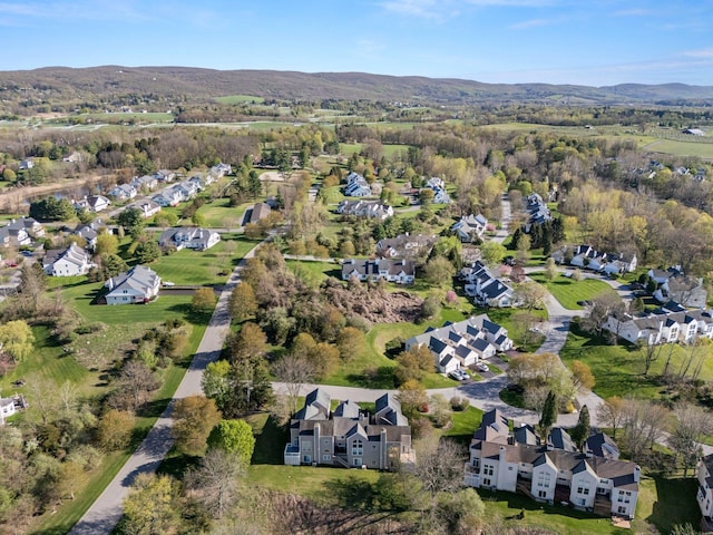 birds eye view of property featuring a mountain view and a residential view