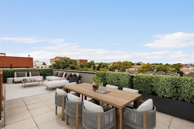 view of patio featuring outdoor lounge area and outdoor dining space