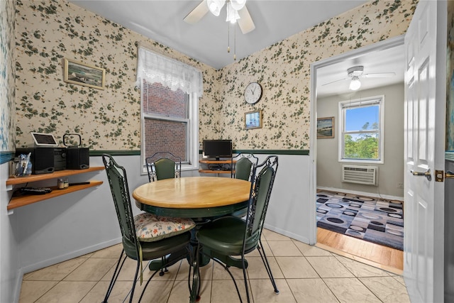 6300 Riverdale Ave Unit 5E, Bronx, NY 10471 - dining area featuring wainscoting, ceiling fan, wallpapered walls, an AC wall unit, and light tile patterned floors