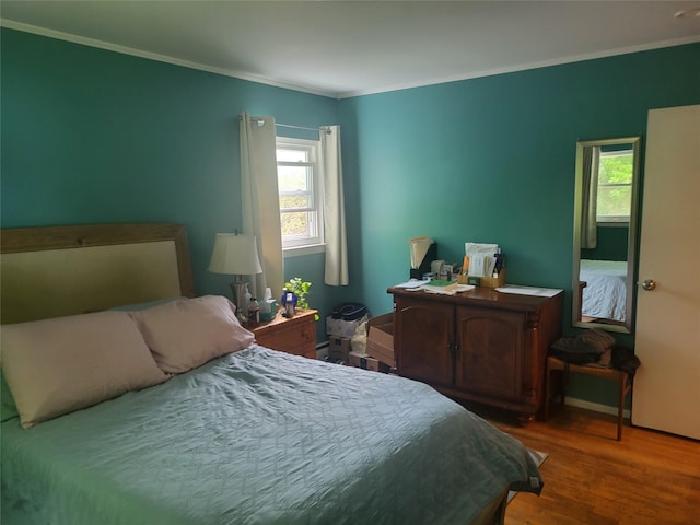 142 Pembrook Dr, Yonkers, NY 10710 - bedroom with crown molding and wood finished floors