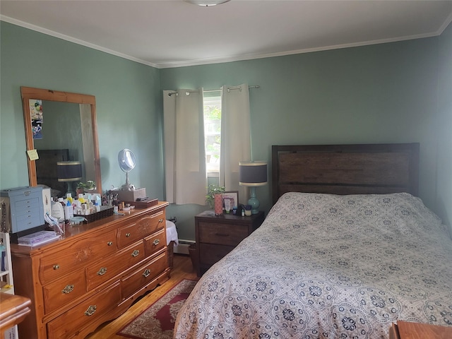 142 Pembrook Dr, Yonkers, NY 10710 - bedroom featuring ornamental molding, wood finished floors, and a baseboard heating unit