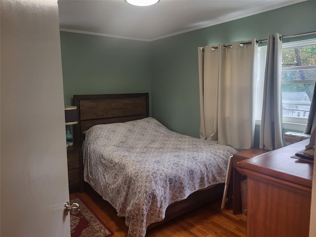 142 Pembrook Dr, Yonkers, NY 10710 - bedroom with dark wood-style flooring and ornamental molding
