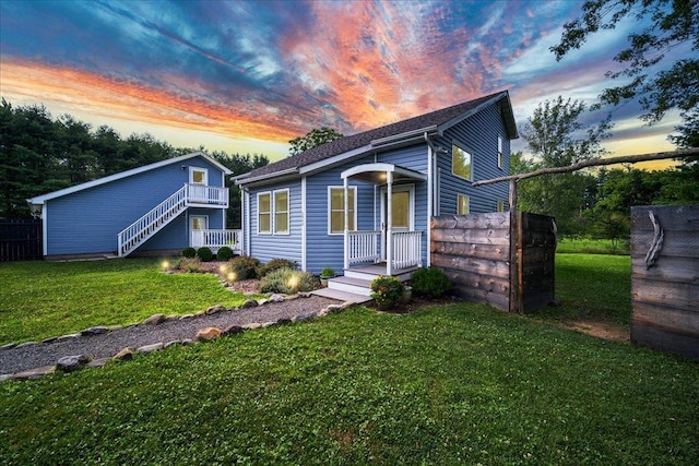 view of front of property with a yard