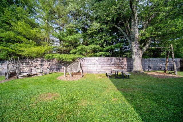 view of yard featuring fence
