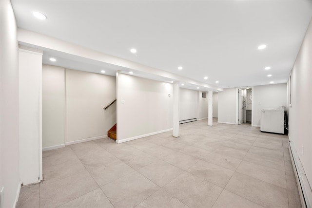61-12 160th St, Fresh Meadows, NY 11365 - finished below grade area with a baseboard heating unit, washer / dryer, recessed lighting, stairway, and light tile patterned flooring