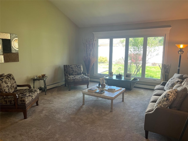 carpeted living area with a baseboard heating unit and lofted ceiling