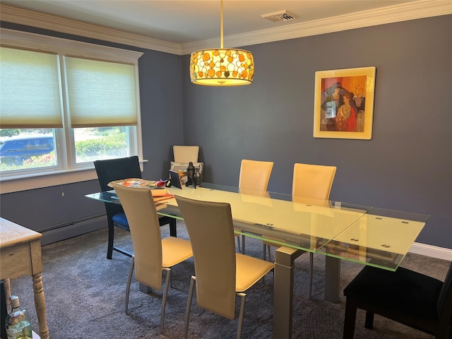 carpeted dining space featuring crown molding, a baseboard heating unit, and visible vents