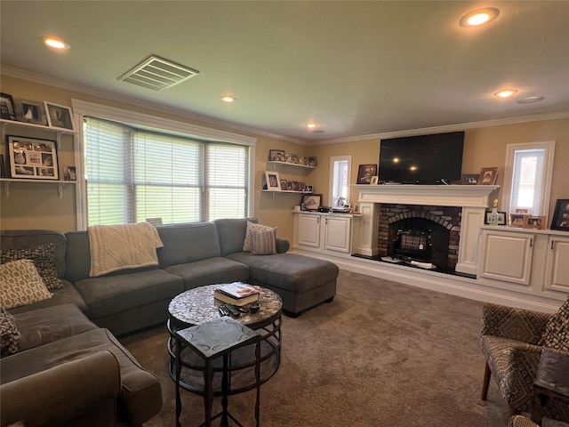 living room featuring crown molding, visible vents, a wealth of natural light, and carpet