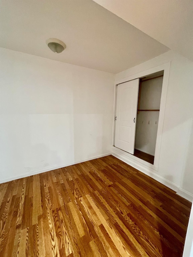 58 7th St, Valley Stream, NY 11581 - unfurnished room with wood finished floors and baseboards