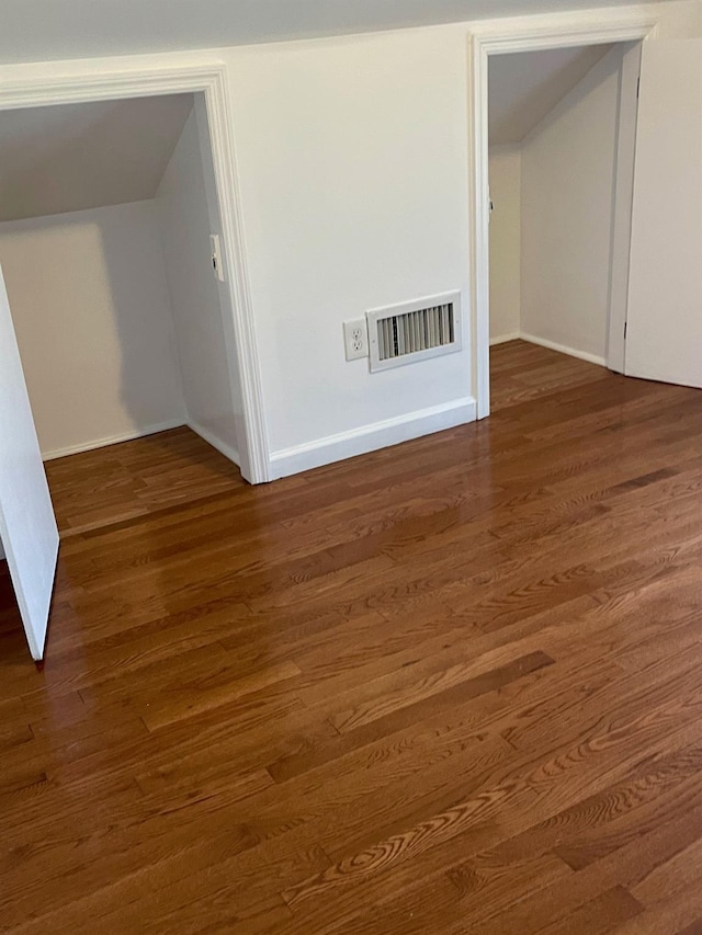 58 7th St, Valley Stream, NY 11581 - empty room with wood finished floors and baseboards