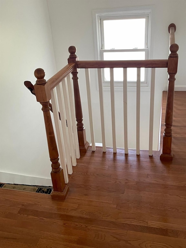58 7th St, Valley Stream, NY 11581 - stairs with wood finished floors and baseboards