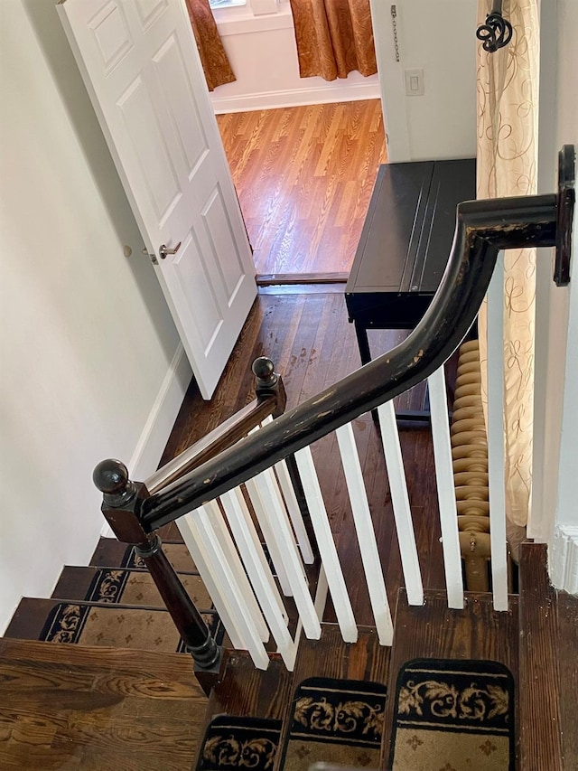 58 7th St, Valley Stream, NY 11581 - staircase featuring wood finished floors