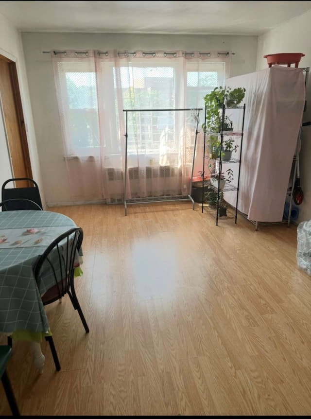 dining space with light wood-style floors