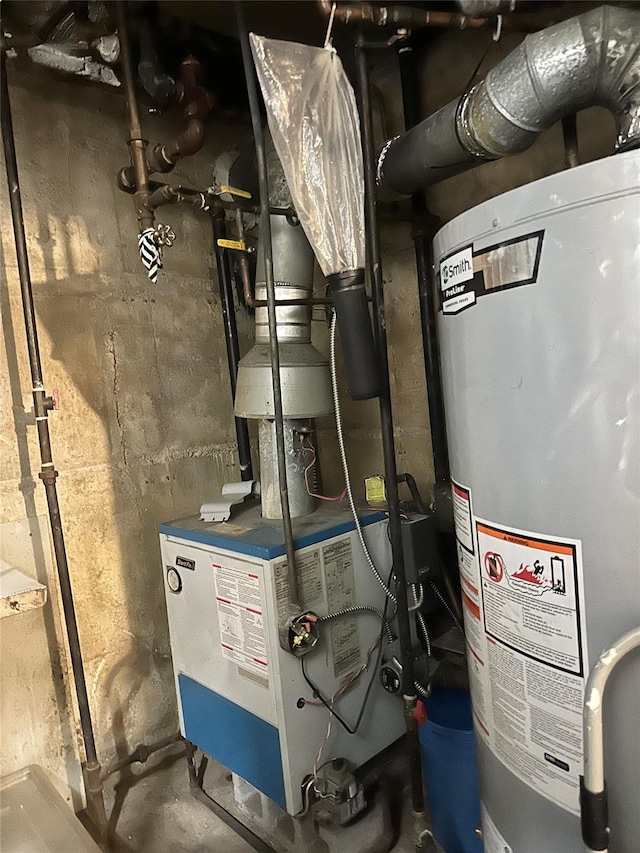 utilities featuring gas water heater and a heating unit