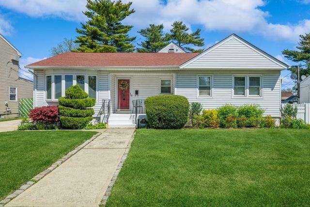 708 Seabury Ave, Franklin Square, NY 11010 - view of front facade featuring a front yard