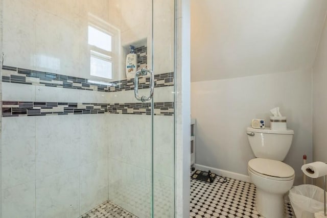 708 Seabury Ave, Franklin Square, NY 11010 - bathroom with baseboards, a shower stall, and toilet