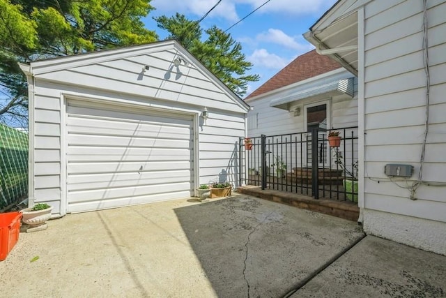 708 Seabury Ave, Franklin Square, NY 11010 - detached garage featuring fence and driveway