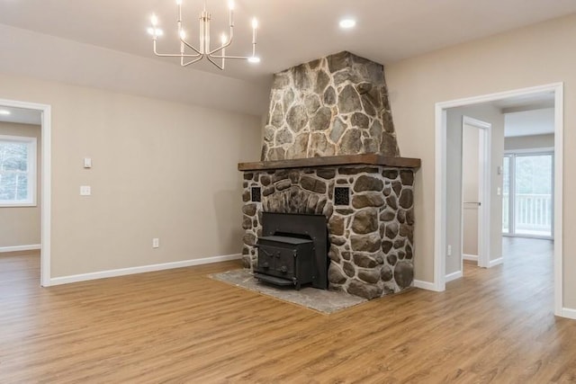 435 State Route 55, Eldred, NY 12732 - living area with an inviting chandelier, baseboards, wood finished floors, and a wealth of natural light