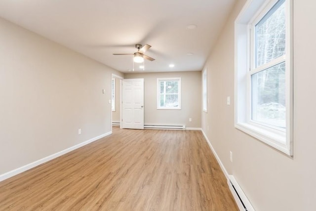 435 State Route 55, Eldred, NY 12732 - empty room featuring ceiling fan, baseboards, a baseboard radiator, and light wood-style flooring