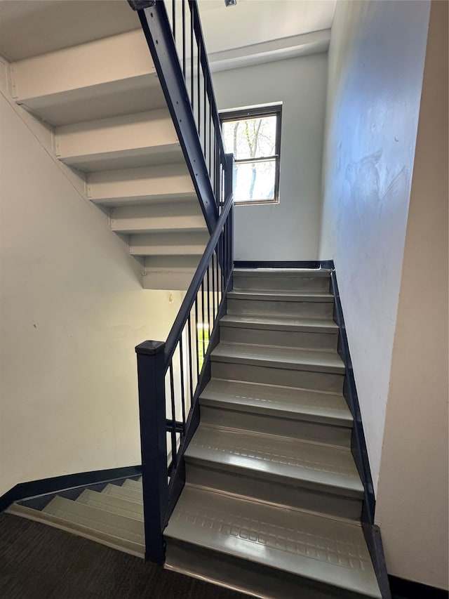 91 Tulip Ave Unit C2, Floral Park, NY 11001 - staircase featuring baseboards