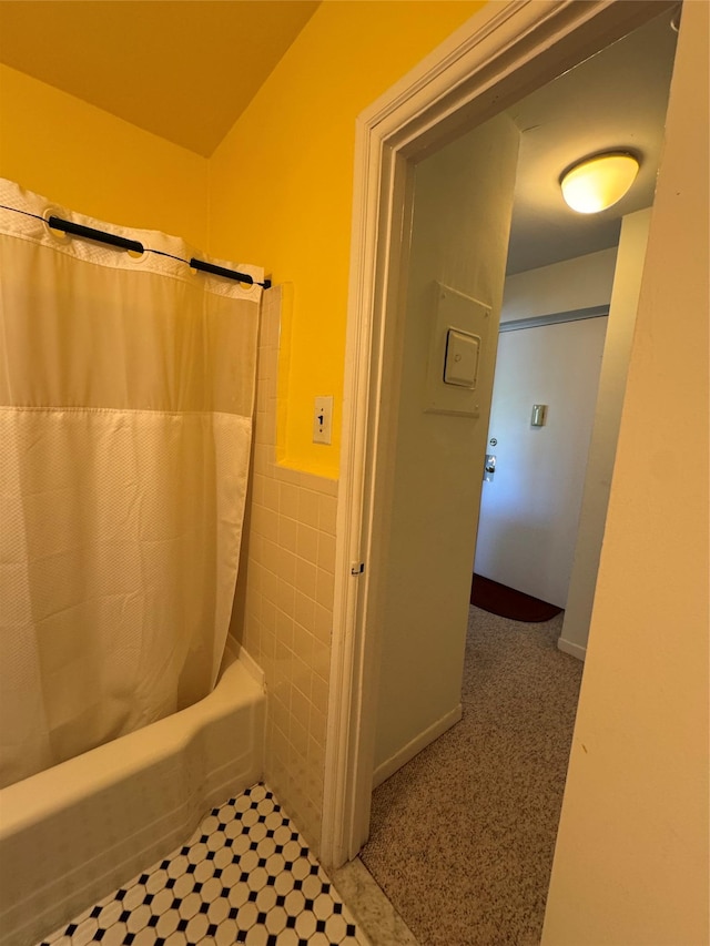 91 Tulip Ave Unit C2, Floral Park, NY 11001 - bathroom with shower / tub combo with curtain